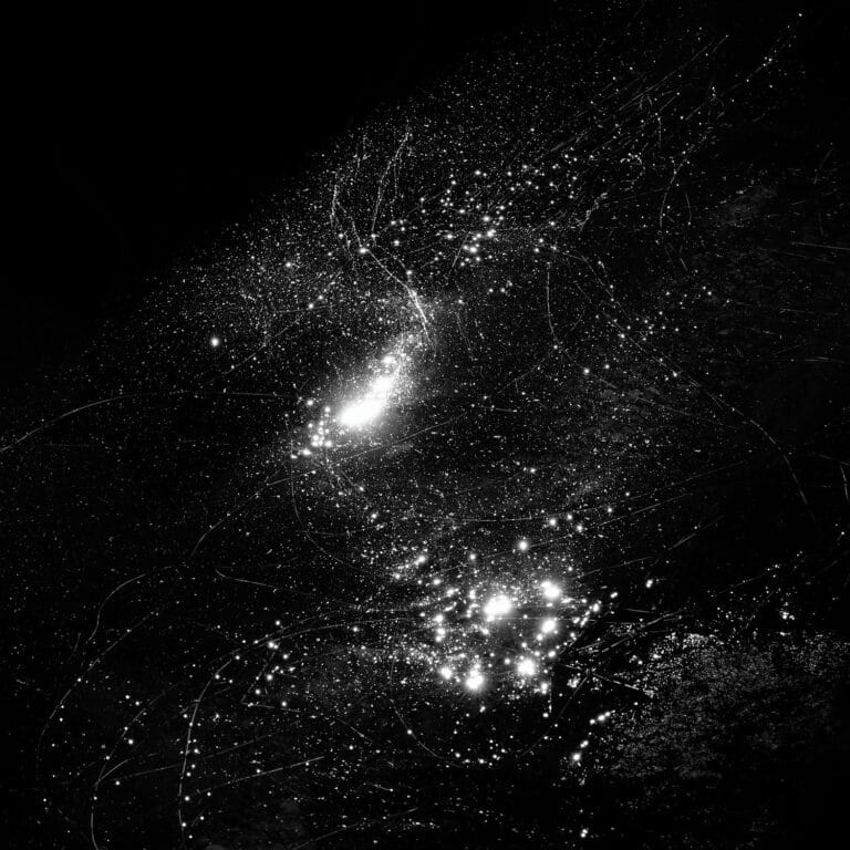 Taurus: reflections in water looking like the constellation Taurus in the starry night sky