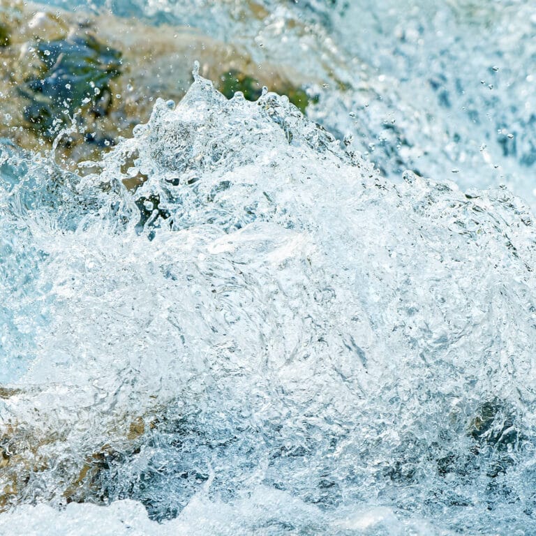 splashing water looking like the Horses of Neptune jumping out of water waves
