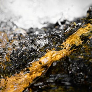 fine art photography of splashing water drops looking like the Milky Way