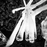 icicles in a river, looking like the Northern Star