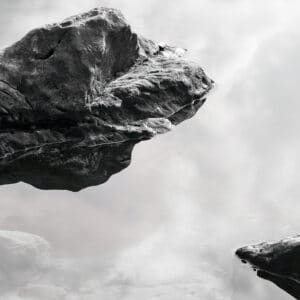 stones in water, looking like floating through space and time